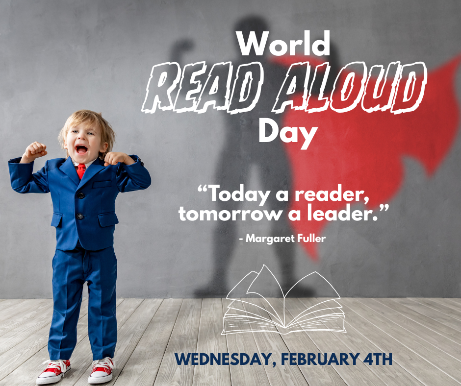 A young child in a suit does a strongman pose and his shadow shows a superhero cape.