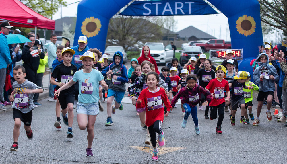 Children Running in Light up the night for noelle