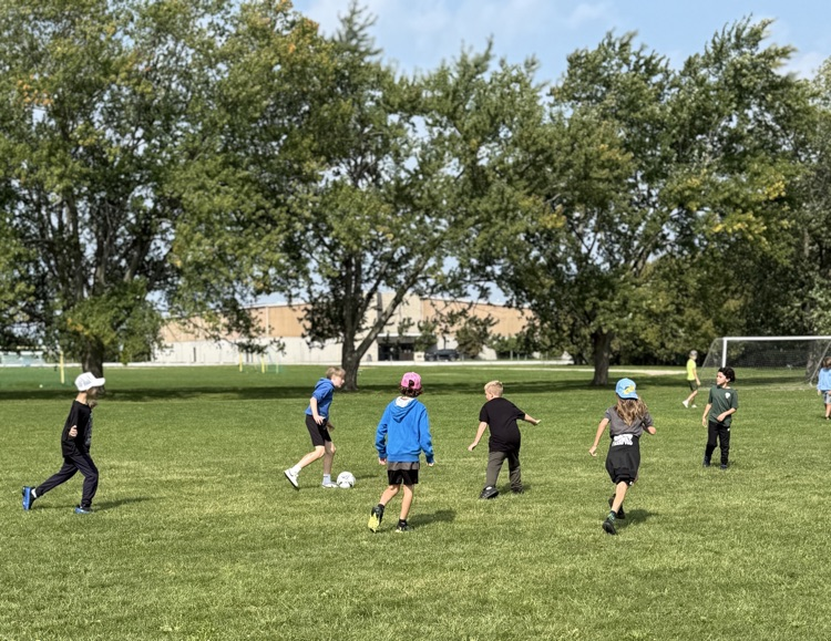 students playing soccer