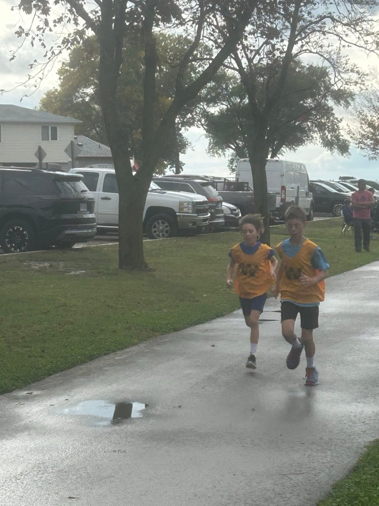 2 Wheatley warriors running a cross country race