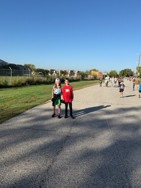 two male students smiling at the camera during our Terry Fox run