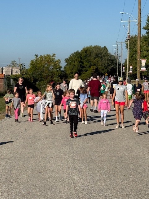 students running and walking outside on a road for Terry Fox 2025