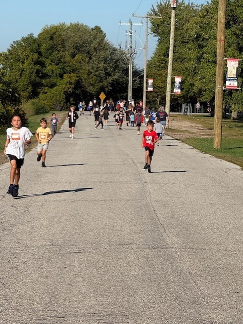 students running outside on a road for Terry Fox 2025
