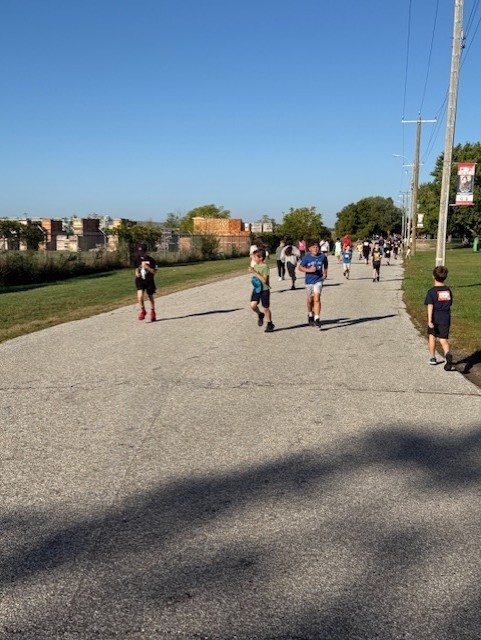 students running outside on a road for Terry Fox 2025