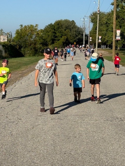 students running and walking outside on a road for Terry Fox 2025