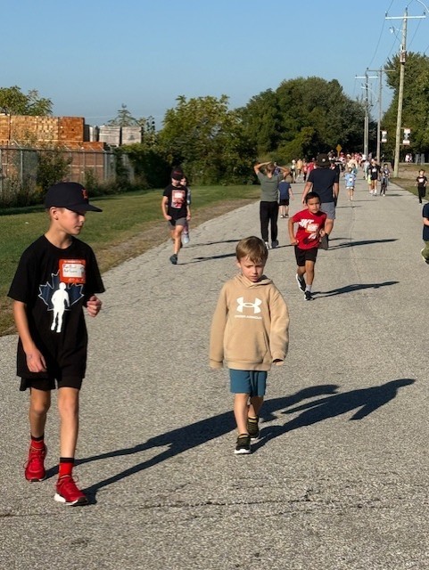 group of students and adults walking for the Terry Fox Run today