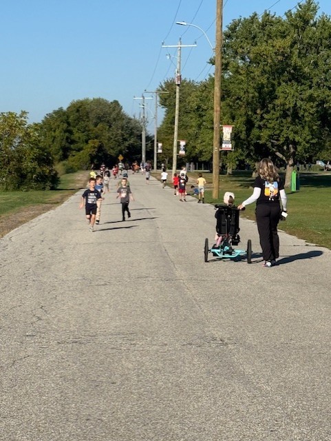 large group of students and adults walking for the Terry Fox Run today