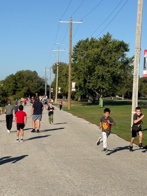 two boys running for the Terry Fox Run today