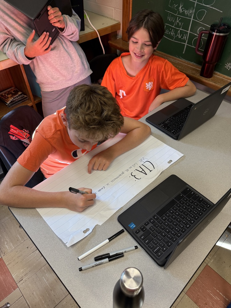 students working in groups 