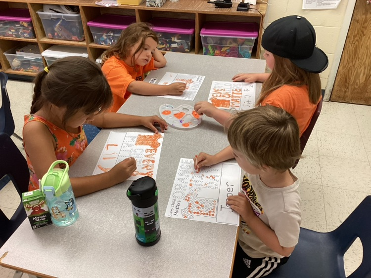 students working on dot art 