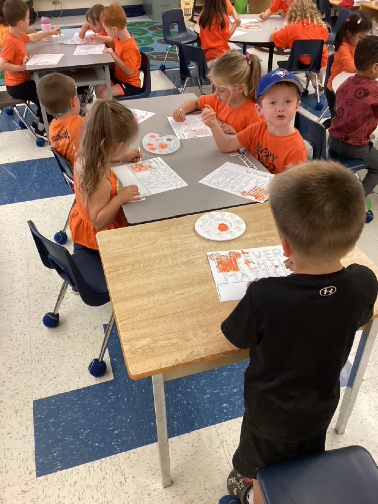 students working on dot art 