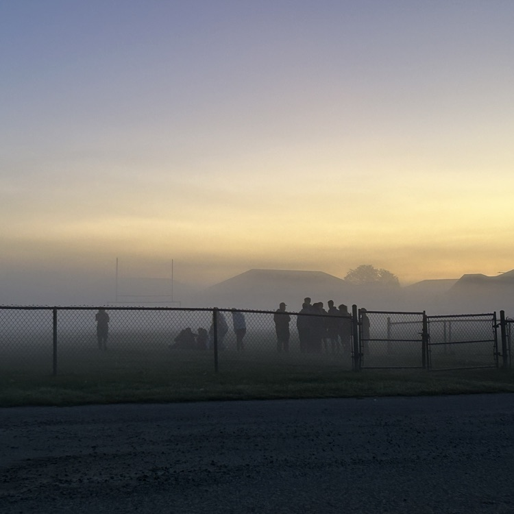 students standing in the fog