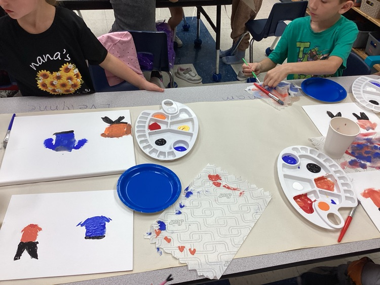 learning about orange shirt day as they paint