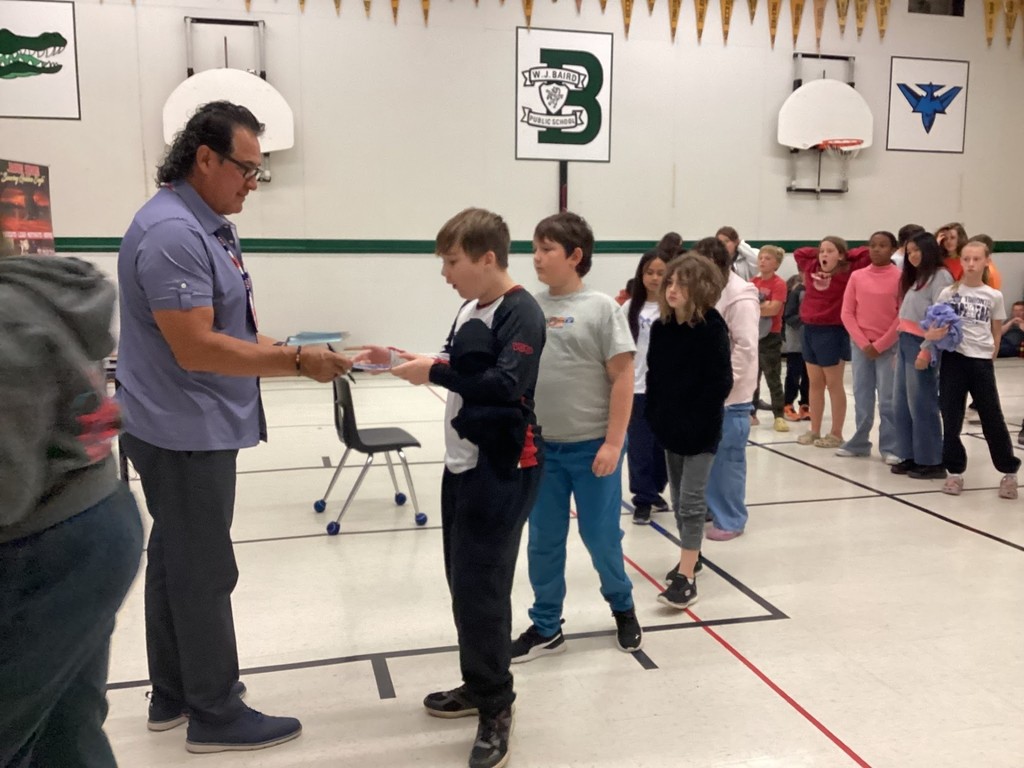 Students eagerly waiting for autographs!