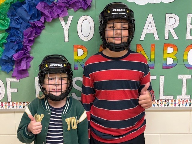 students wearing helmets