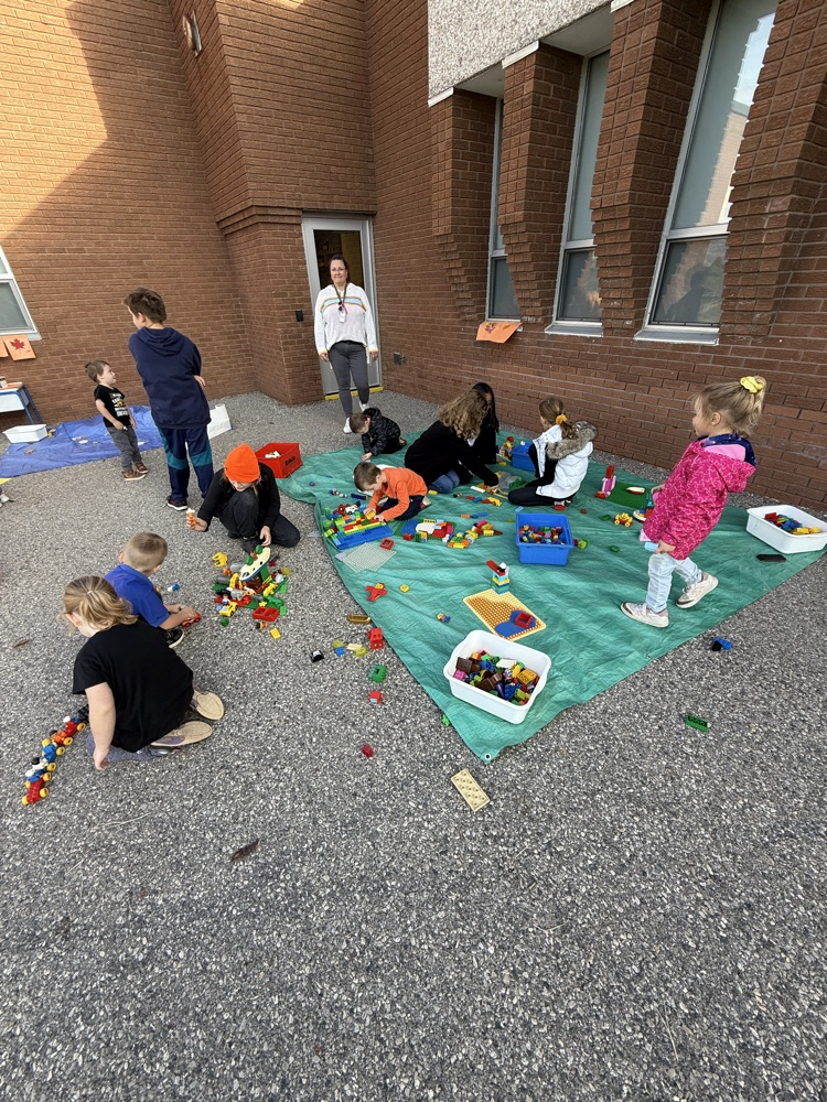 Students playing with Lego