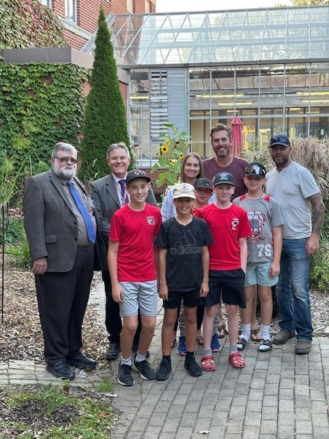 Group of staff, students and trustee