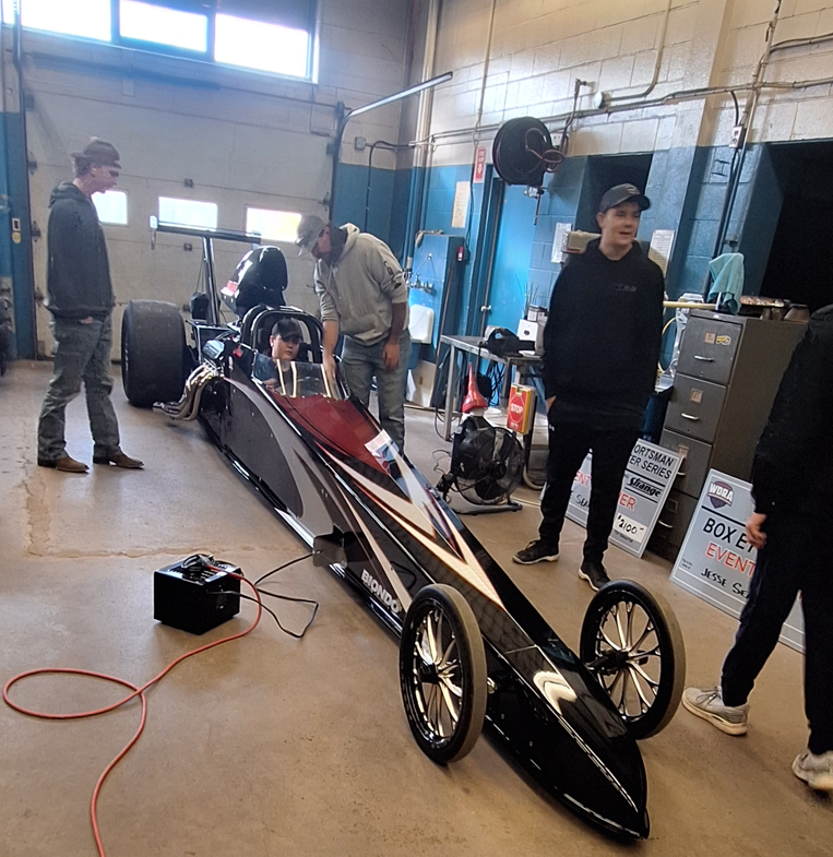 Students in the Dragster with Jesse Searson