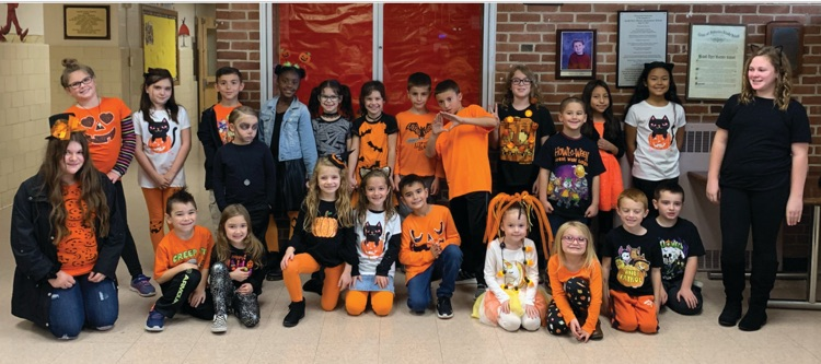 students dressed in Orange and Black clothing 
