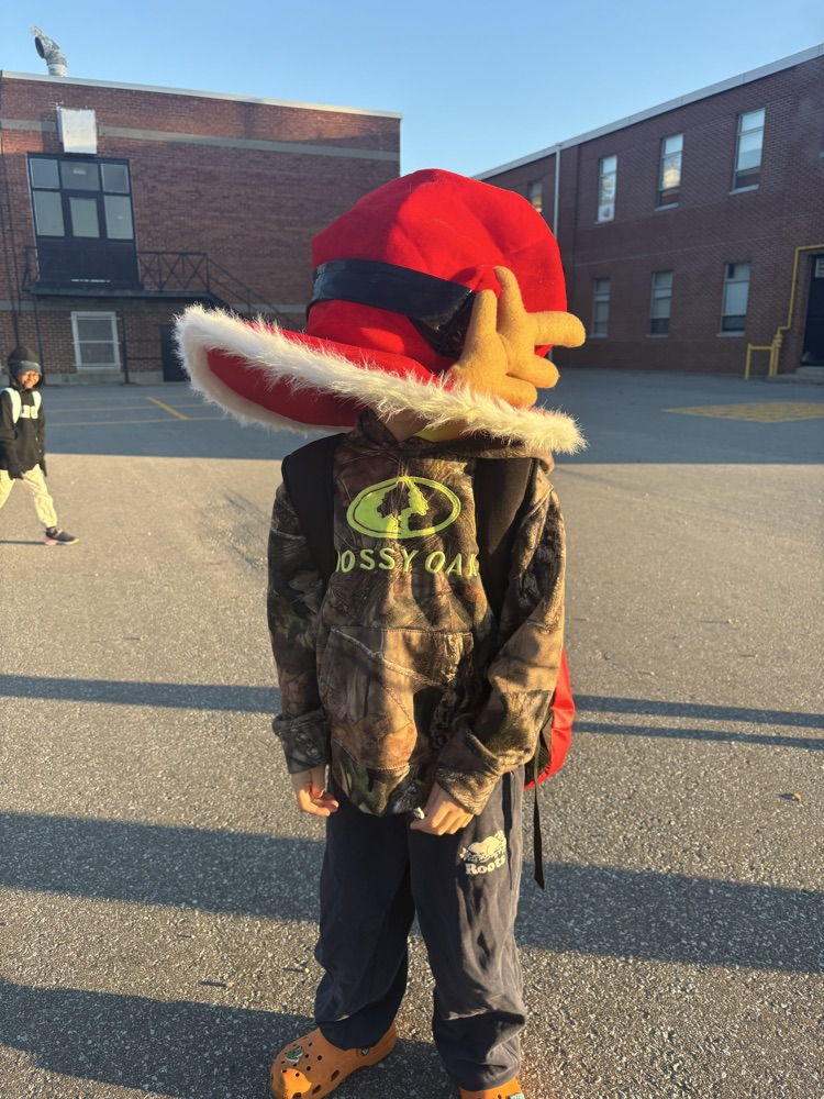 student wearing oversized hat 