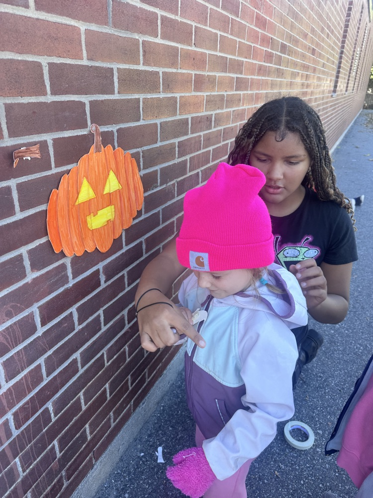 Students drawing with