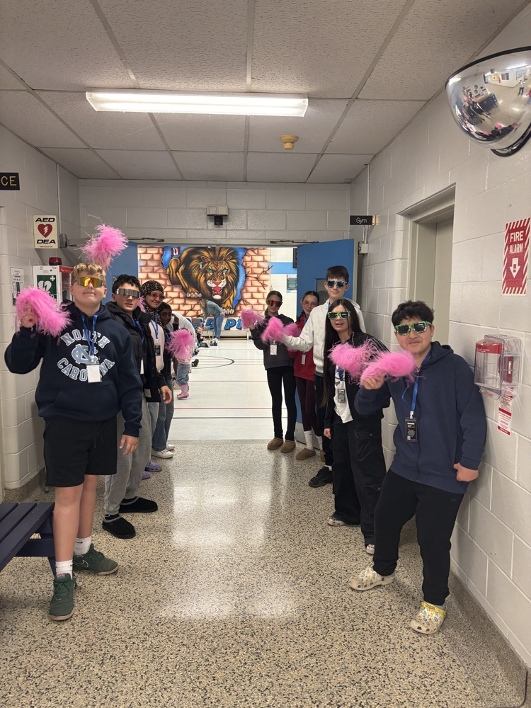 the energy crew welcoming students to the gym