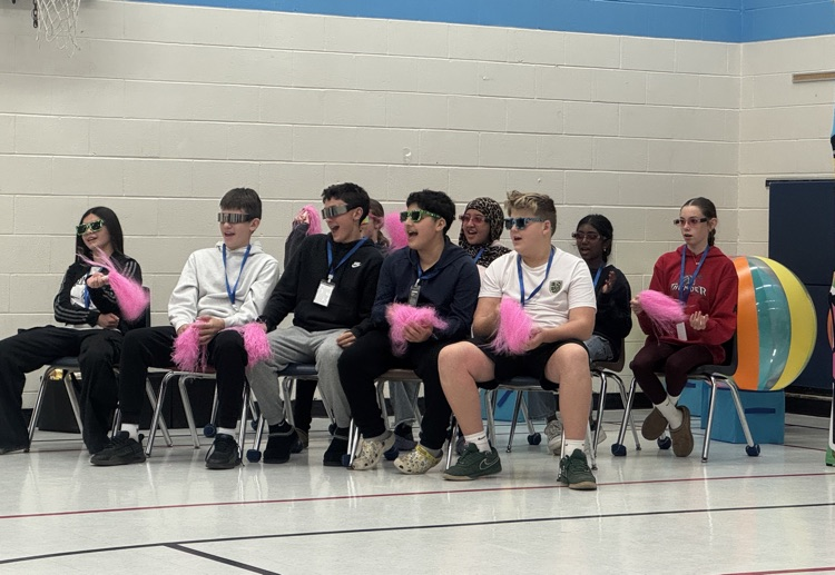 the energy crew sitting on chairs in a group