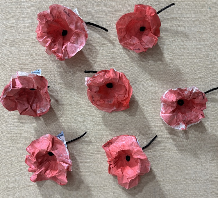 Artwork showing puppies made out of paper Mâché