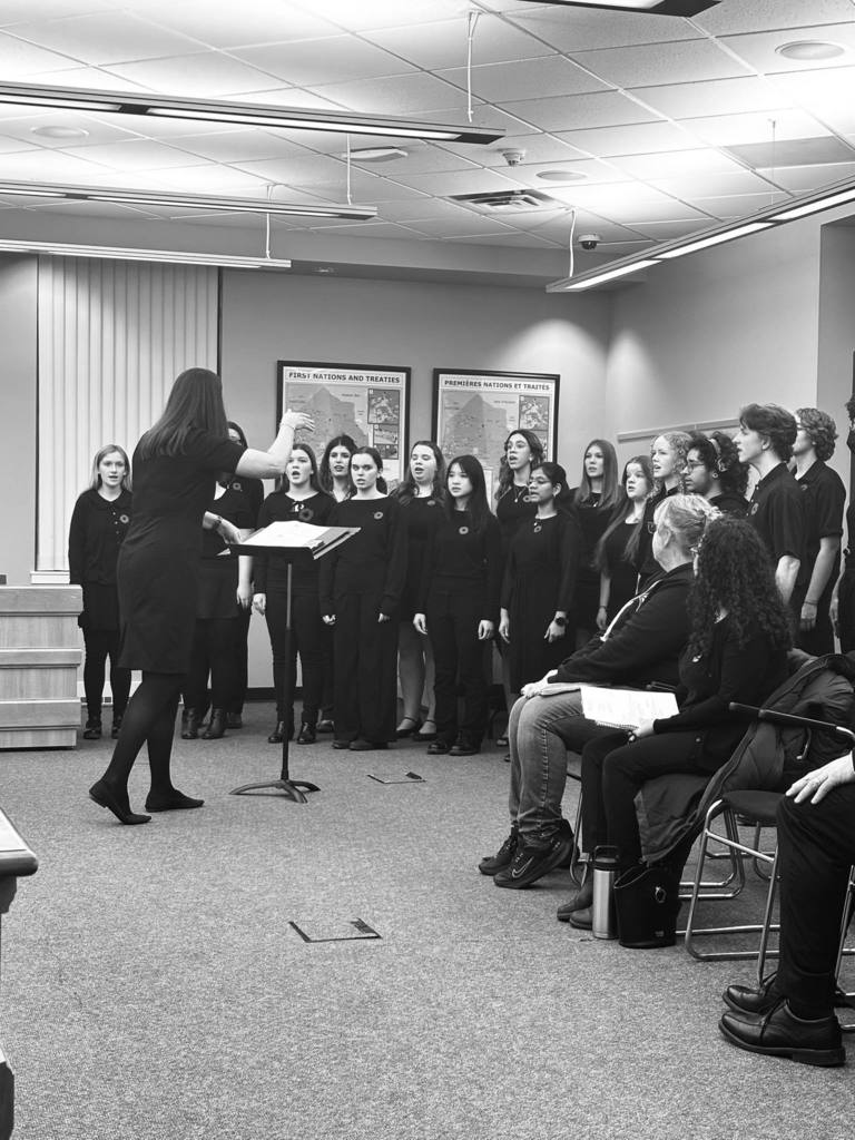 CKSS choir performs to public board meeting on remembrance day