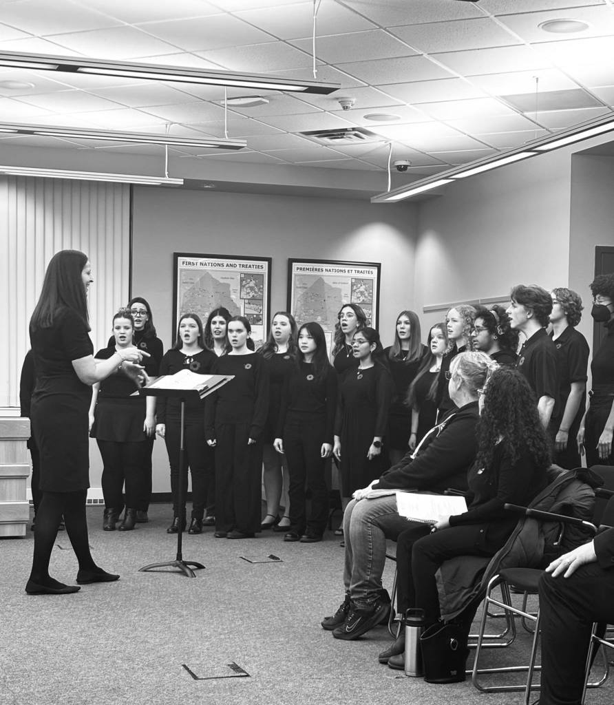 CKSS choir performs to public board meeting on remembrance day