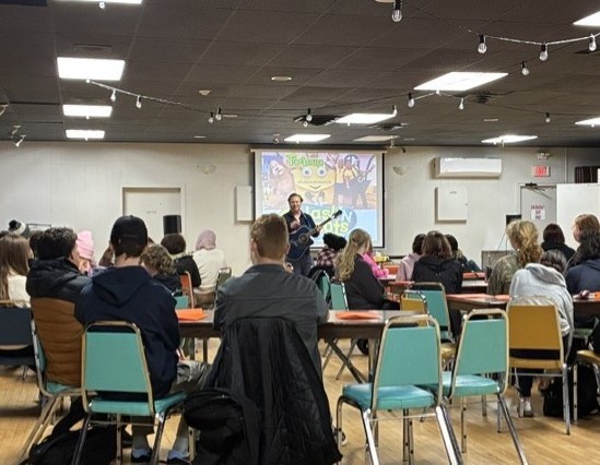 Nick Adams of Splash & Boots inspiring the students.