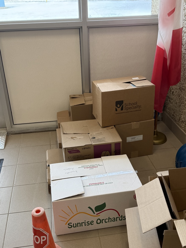 many boxes full of food donations