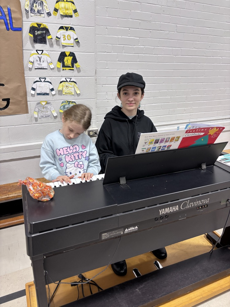 A student provided piano music