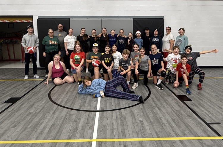 girls and boys volleyball teams and a few staff 