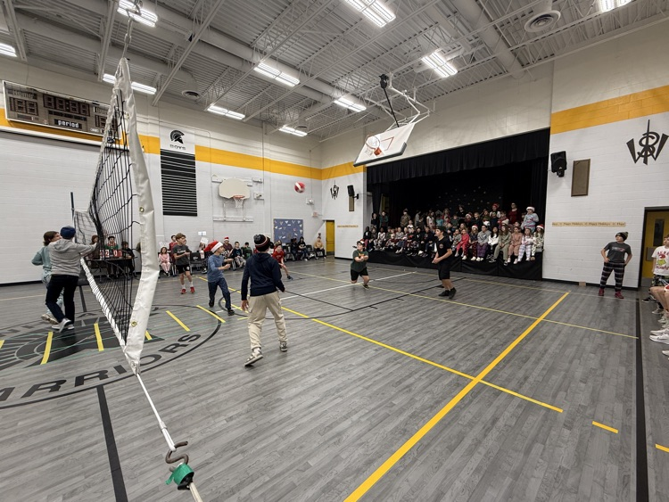 Staff versus student students volleyball game