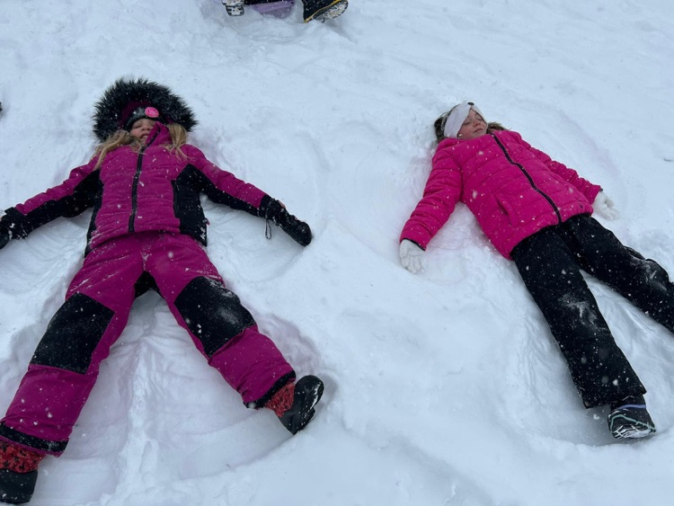 Children making snow angels