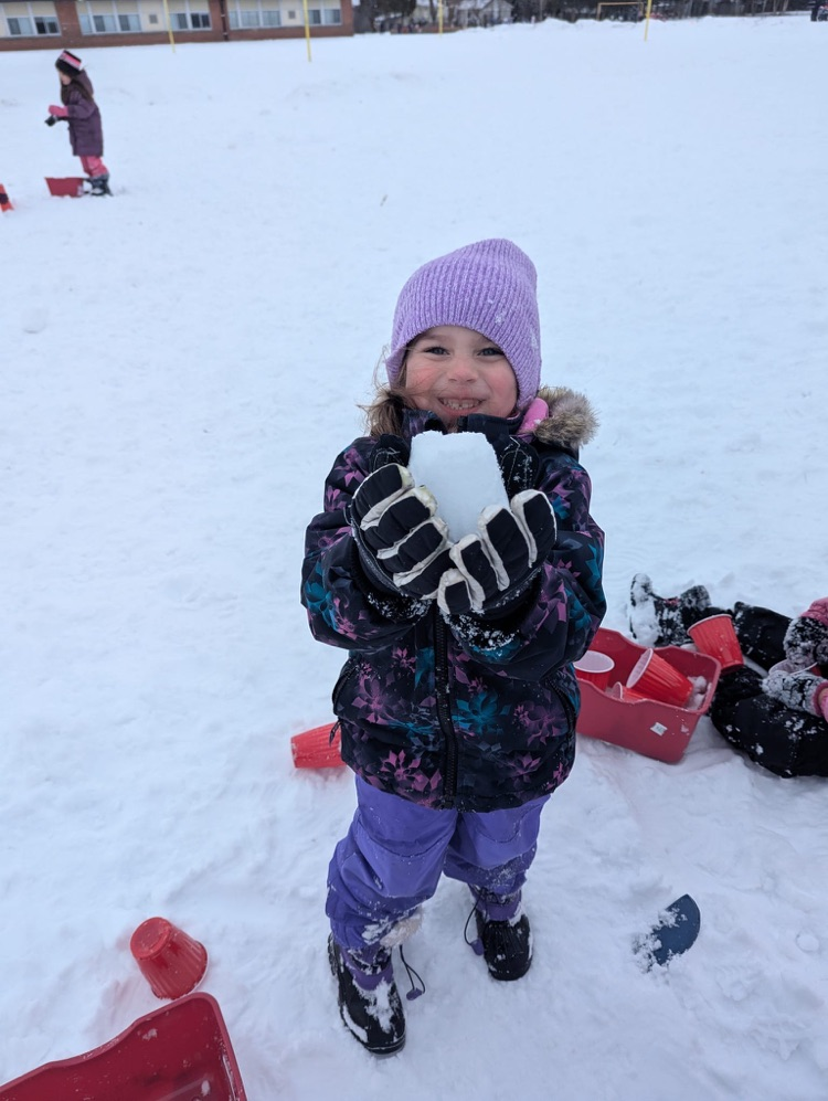 Child playing in the snow