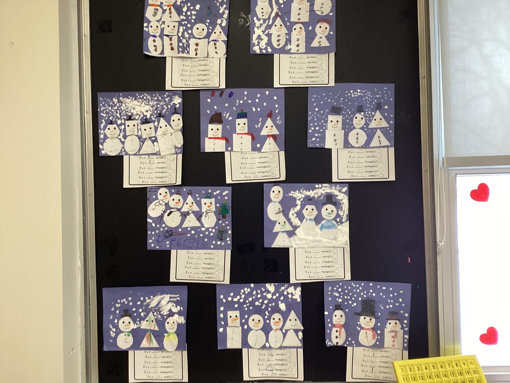 FDK enjoyed  working with their learning buddies making shape snowmen!
