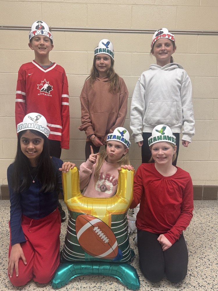 group photo wearing superbowl crowns