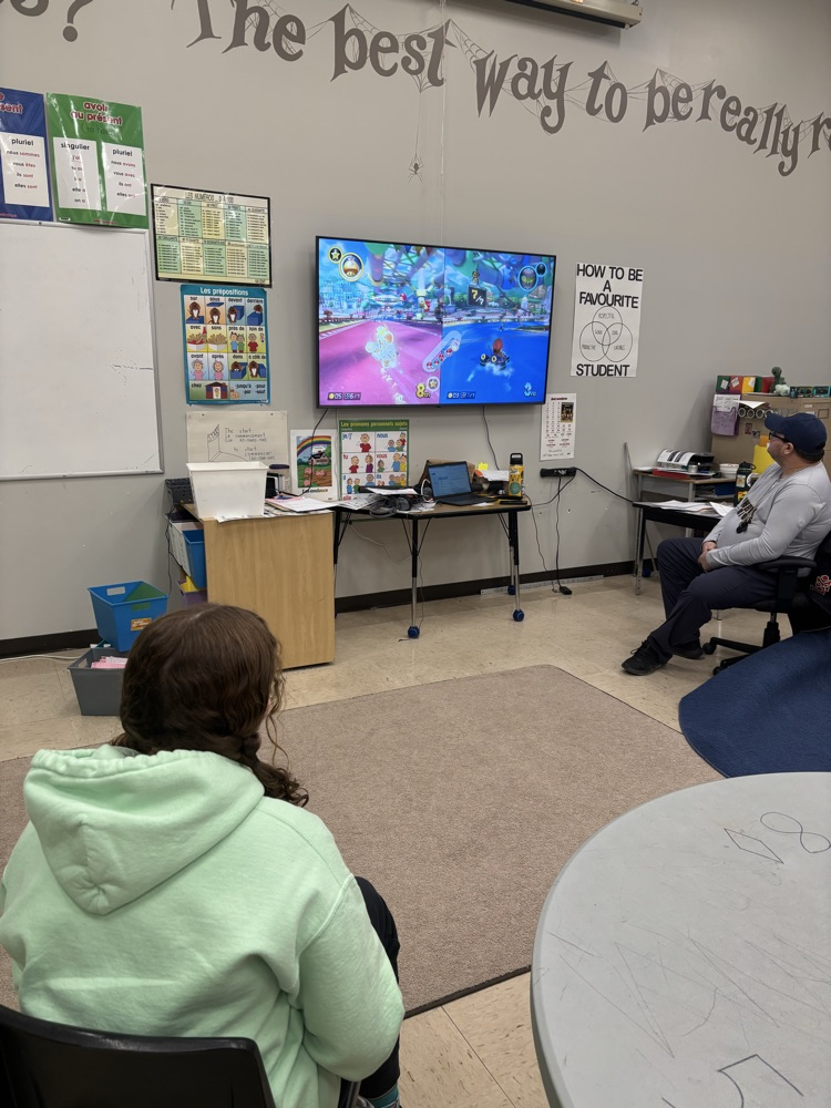 female student playing Mario Kart