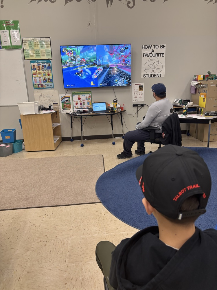 male student playing Mario Kart
