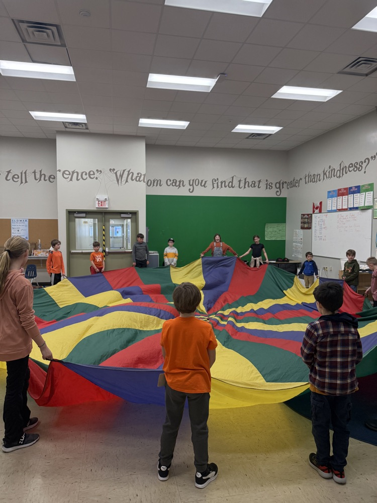 everyone holding on to the parachute