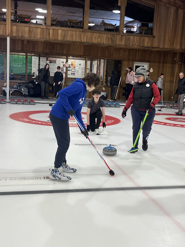 students curling at the Chatham Granite club