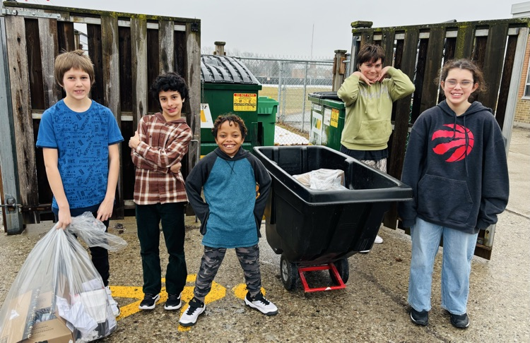 taking the recycling to the appropriate bin