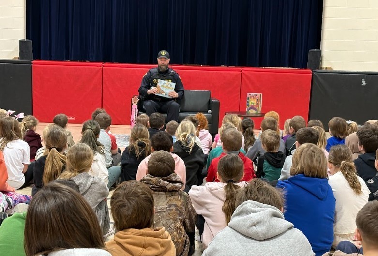 Officer Campbell kicking of March Madness at Riverview Central!