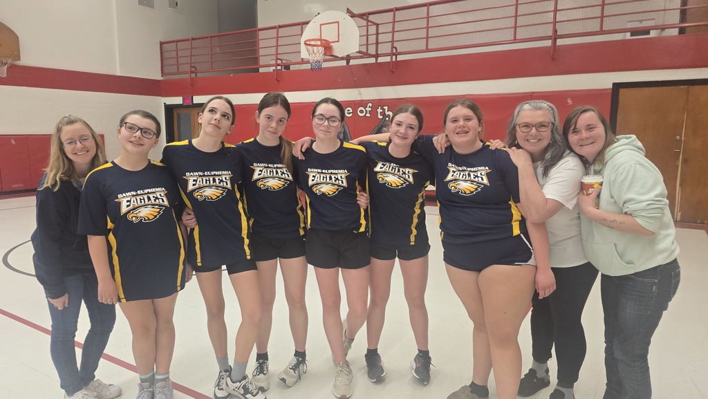 Girls basketball team with coaches