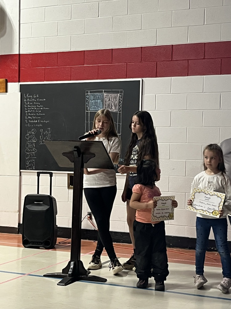 students at a podium 
