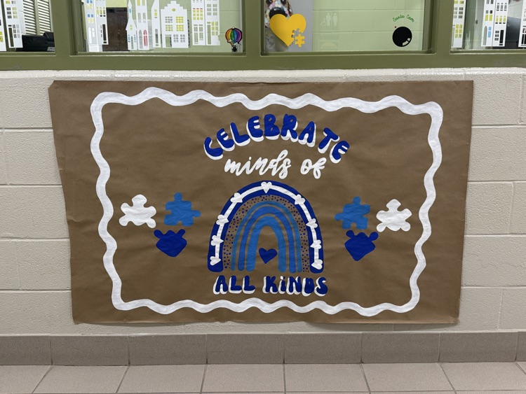 School made banner that says celebrate minds of all kinds