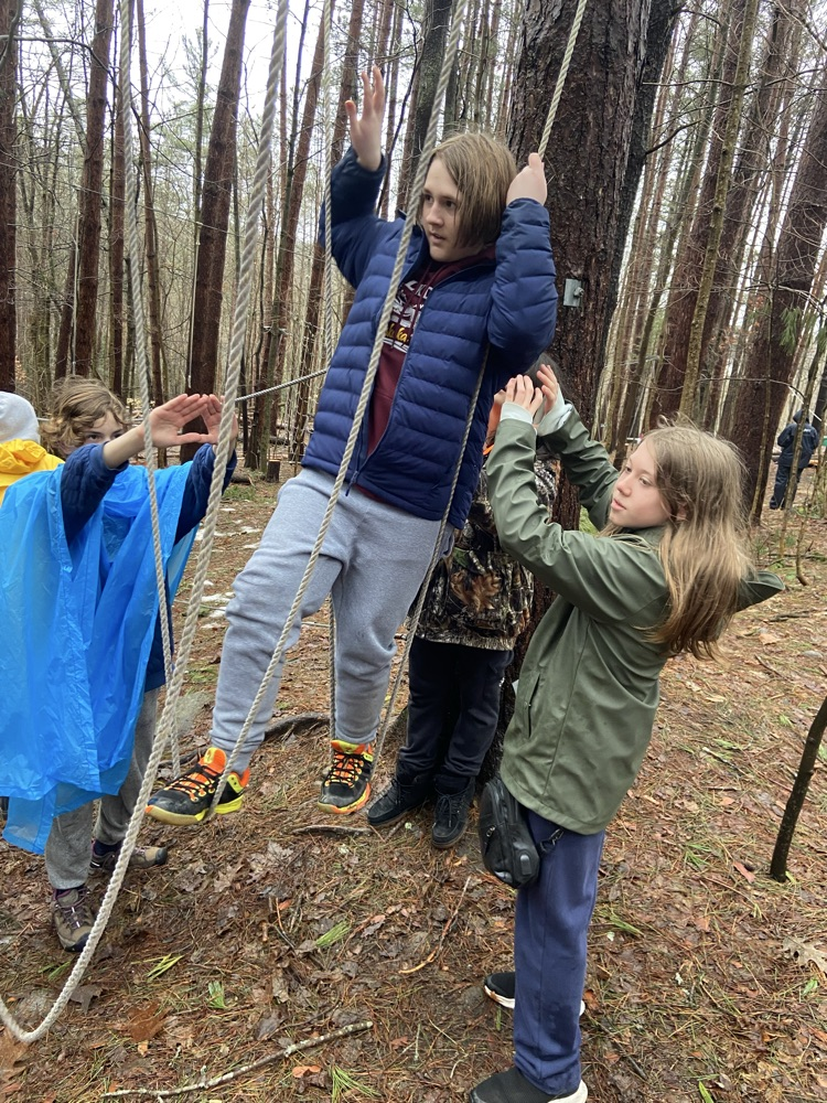 student on flow rope course