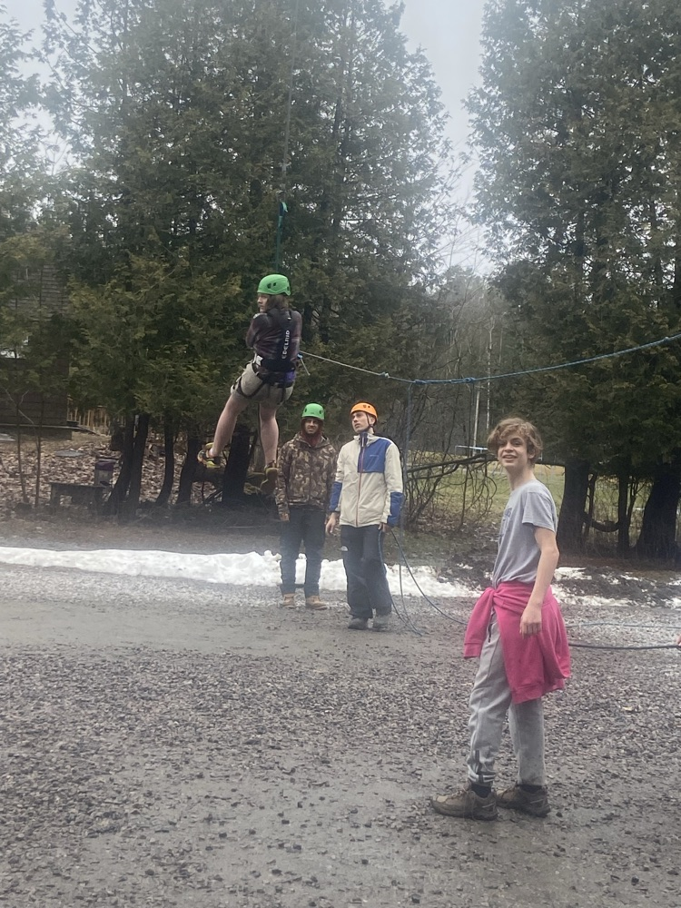 students on low ropes course